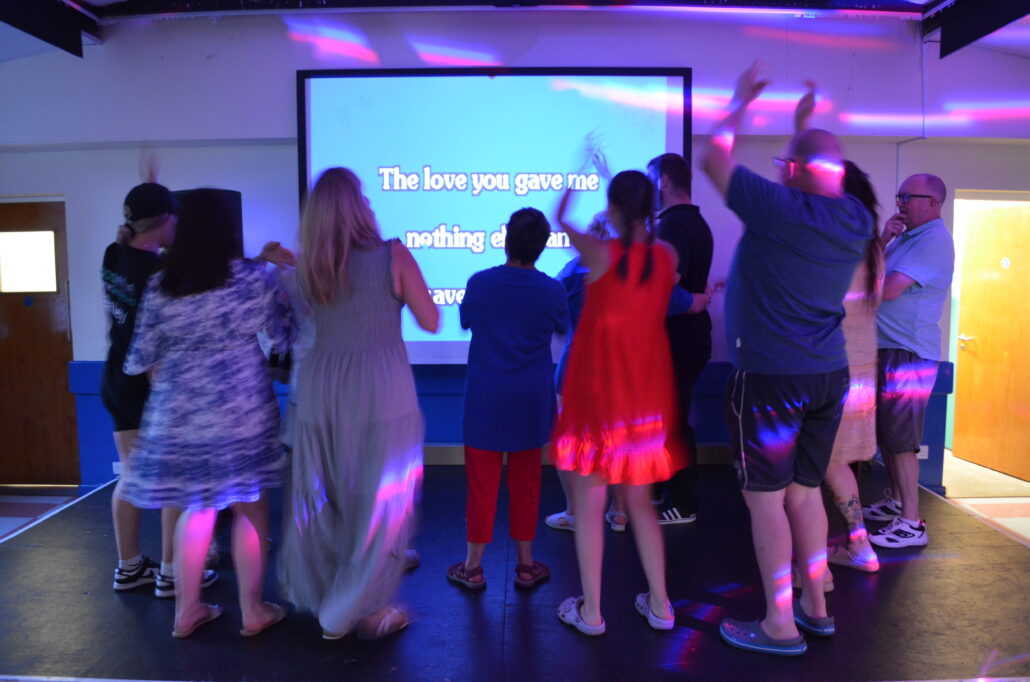 people dancing and singing at barnstondale activity centre