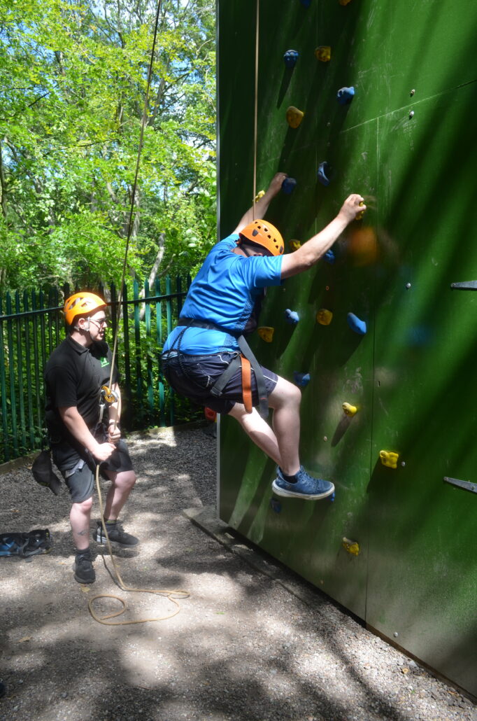 person climbing wall at barnstondale activity centre